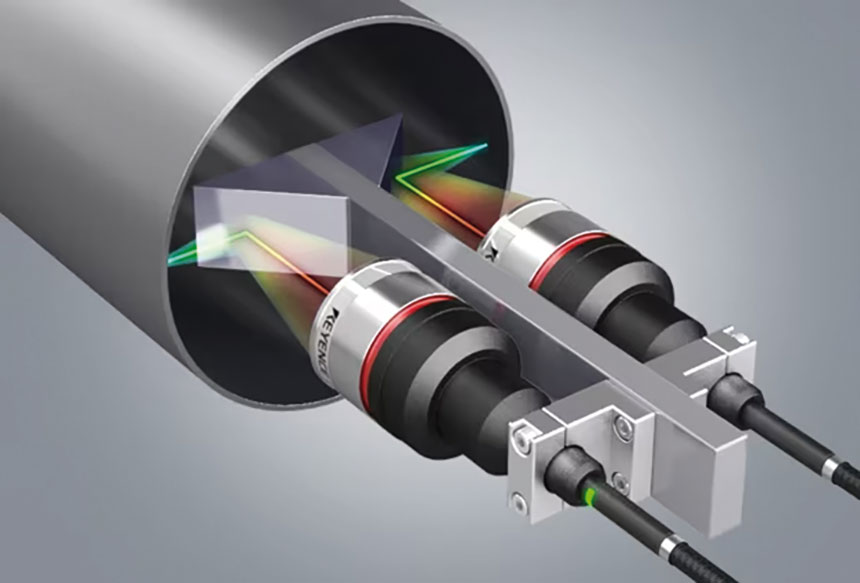 Ce capteur de déplacement confocal assure des mesures de haute précision dans différentes applications. Ici, la mesure du diamètre intérieur 
d’un tuyau. Source : Keyence