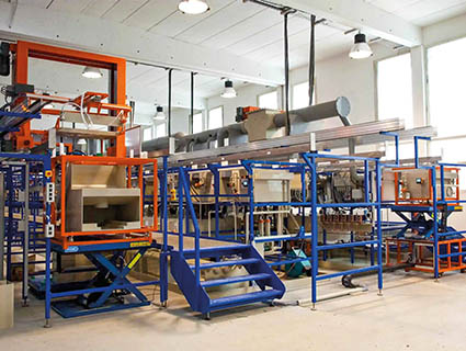 HACER Group assure des prestations globales : traitements thermiques, préparation mécanique, traitements de surface standards ou de contact. Ici, une ligne entièrement automatisée et gérée par calculateur. Source : Hacer Group